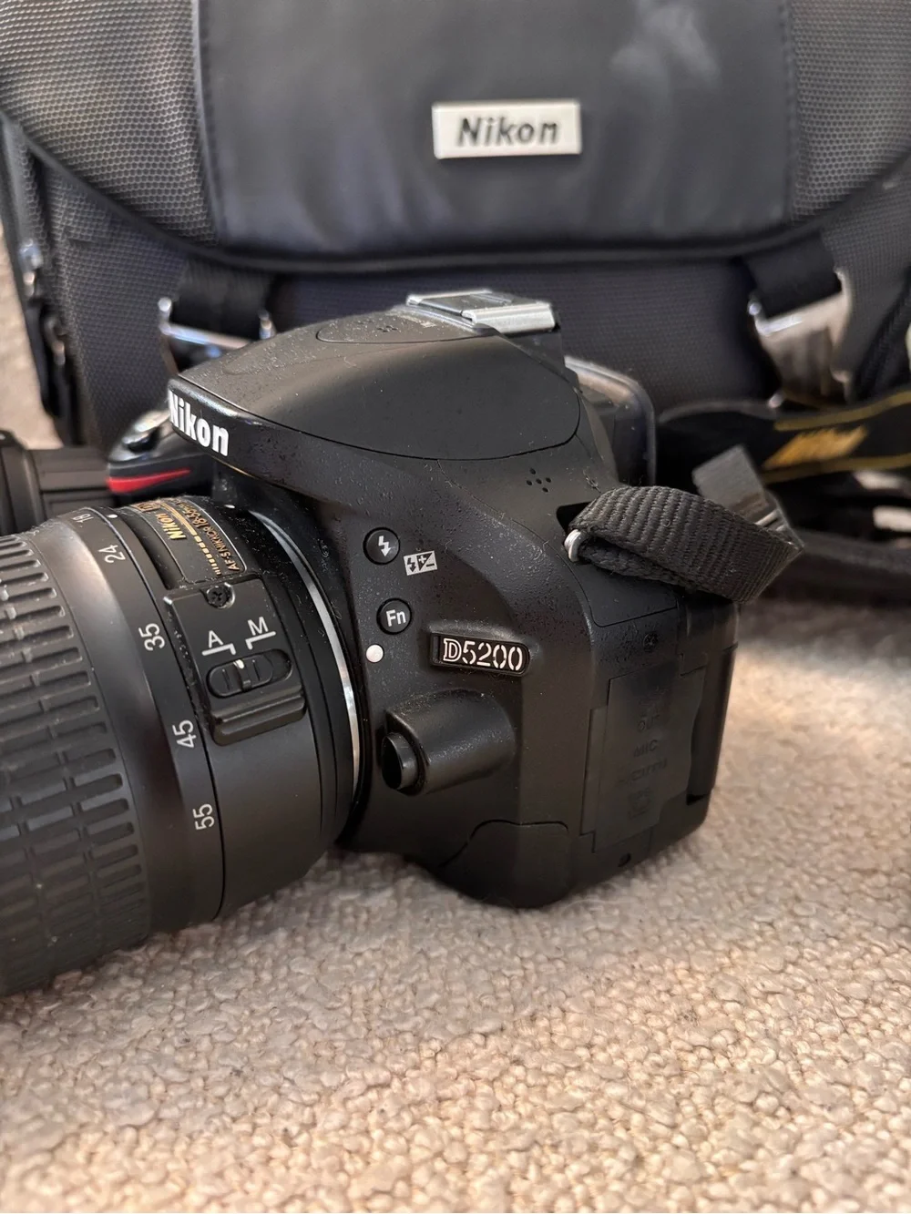 Nikon D5200 DSLR Camera Kit with 3 Lenses and Carry Bag